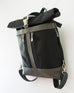 Wanderer - Vegan-friendly Leather - Rolled-top Backpack - Front/Side View